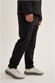 Купить оптом Брюки трикотажные Anta TRN-ESSENTIAL Knit Track Брюки 852627321-1 852627321-1