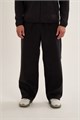 Купить оптом Брюки трикотажные утепленные Anta FLEECE ODP Knit Track Брюки 852631303F-4 852631303F-4