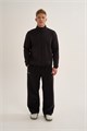 Купить оптом Брюки трикотажные утепленные Anta FLEECE ODP Knit Track Брюки 852631303F-4 852631303F-4