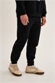 Купить оптом Брюки трикотажные утепленные Anta FLEECE ODP Knit Track Брюки 852631306F-2 852631306F-2