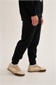 Купить оптом Брюки трикотажные утепленные Anta FLEECE ODP Knit Track Брюки 852631306F-2 852631306F-2
