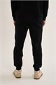 Купить оптом Брюки трикотажные утепленные Anta FLEECE ODP Knit Track Брюки 852631306F-2 852631306F-2