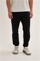 Купить оптом Брюки трикотажные Anta TRN Knit Track Брюки 852637313S-2 852637313S-2