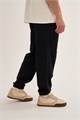 Купить оптом Брюки трикотажные утепленные Anta FLEECE ODP Knit Track Брюки 852638305F-3 852638305F-3