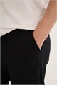 Купить оптом Брюки трикотажные утепленные Anta FLEECE ODP Knit Track Брюки 862637307F-1 862637307F-1