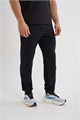 Купить оптом Брюки трикотажные Anta TRN Knit Track Брюки 852627310-1 852627310-1
