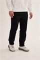 Купить оптом Брюки трикотажные Anta TRN-ESSENTIAL Knit Track Брюки 852637320-1 852637320-1