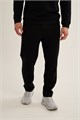Купить оптом Брюки трикотажные Anta TRN-ESSENTIAL Knit Track Брюки 852647310C-1 852647310C-1