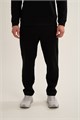 Купить оптом Брюки трикотажные Anta TRN-ESSENTIAL Knit Track Брюки 852647310C-1 852647310C-1