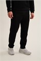 Купить оптом Брюки трикотажные Anta TRN-ESSENTIAL Knit Track Брюки 852647310C-1 852647310C-1
