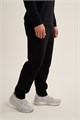 Купить оптом Брюки трикотажные Anta TRN-ESSENTIAL Knit Track Брюки 852647310C-1 852647310C-1