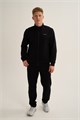 Купить оптом Брюки трикотажные удлиненные Anta TRN-ESSENTIAL Knit Track Брюки 852647310LC-1 852647310LC-1