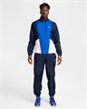 Купить оптом Костюм Nike M NK CLUB WVN TRK SUIT OBSIDIAN/WHITE/GAME ROYAL/WHITE MENS HJ1985-451 - фото 95361